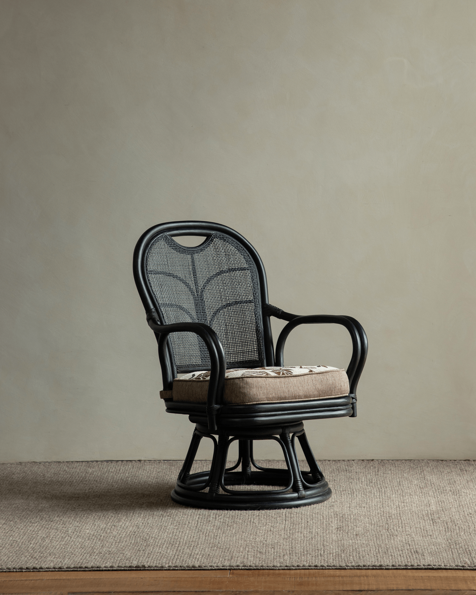 Ray Mini Rattan Swivel Chair