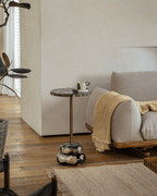 Lolli Beistelltisch aus versteinertem Holz