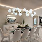 40 Zoll (ca. 102 cm) langer, linearer Kronleuchter im Mid-Century-Modern-Stil mit 16 Leuchten, goldfarbenem Messing, Sputnik-Pendelleuchte mit mattiertem Glaskugel für das Esszimmer