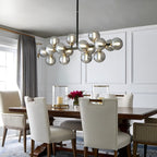 40 Zoll (ca. 102 cm) langer, linearer Kronleuchter im Mid-Century-Modern-Stil mit 16 Leuchten, goldfarbenem Messing, Sputnik-Pendelleuchte mit mattiertem Glaskugel für das Esszimmer