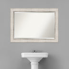 Wandspiegel aus Holz mit Facettenschliff – Rahmen in Silber mit Gittermuster